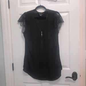 Black shirt with lace sleeves and zip front